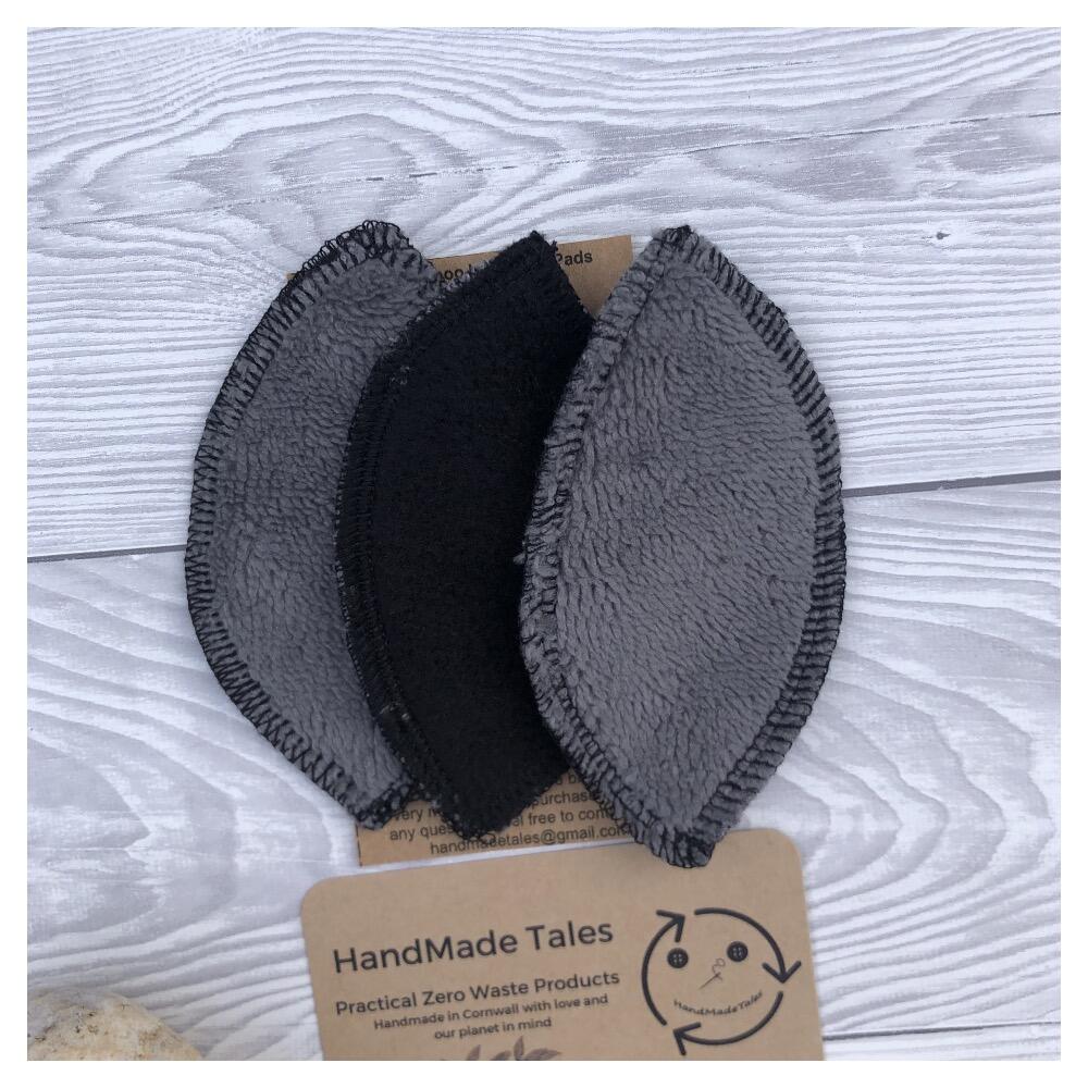 Pack of 3 interlabial pads, dark grey bamboo blend fabric with black fleece backing handmade by HandMade Tales Cornwall, UK