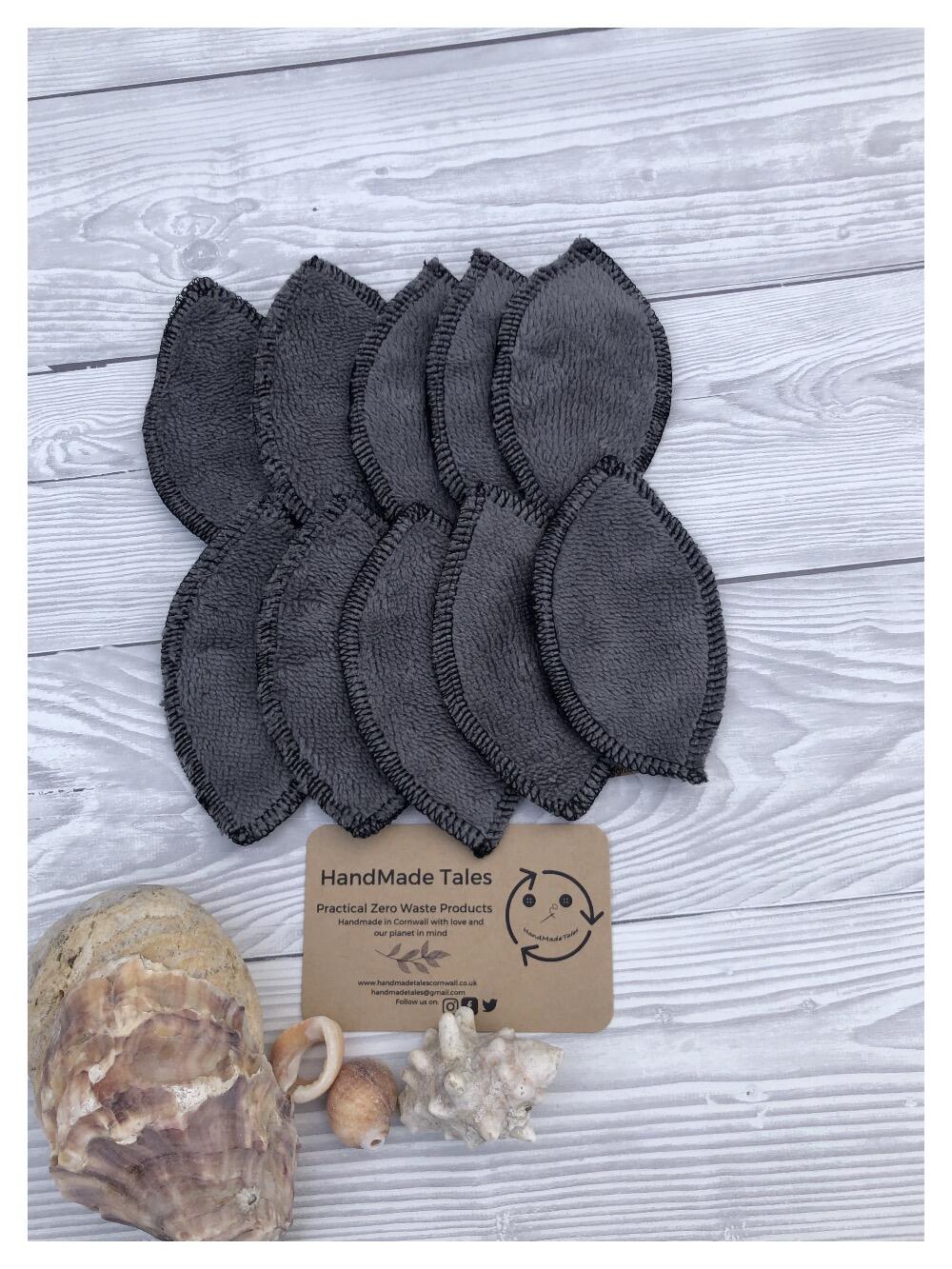 Pack of 10 interlabial pads, dark grey bamboo blend fabric with black fleece backing handmade by HandMade Tales Cornwall, UK