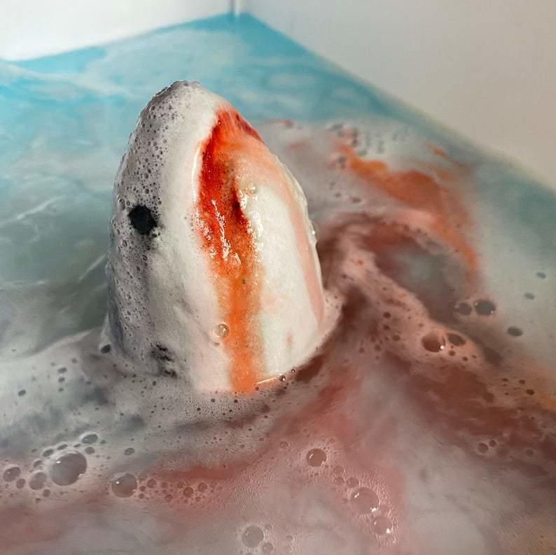 foaminf shark attack bath bomb with jaws effect bleeding from the shark bath bombs mouth