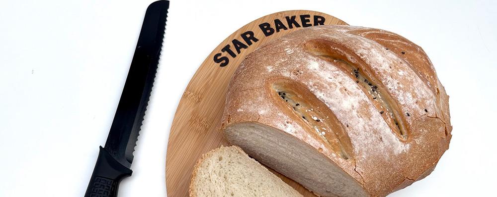 board with STAR BAKER burnt in to wood