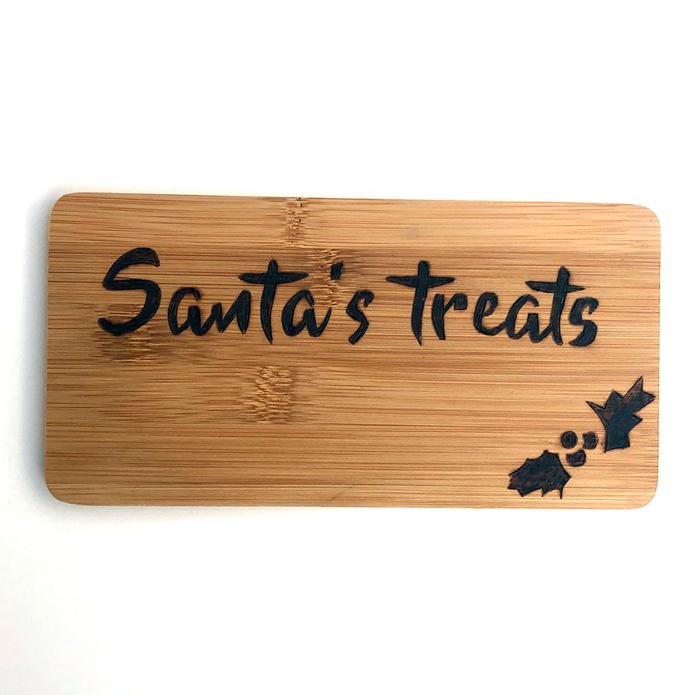 santa treat wooden board with mince pie