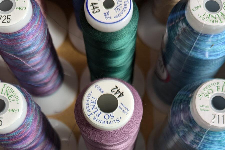 Decorative image of a range of quilting thread