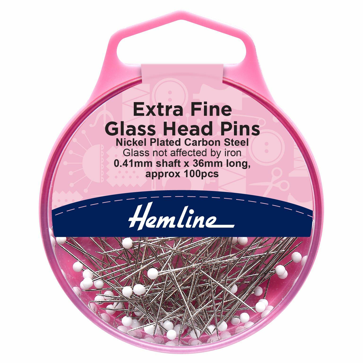 Pink Hemline storage pot containing White glass head pins