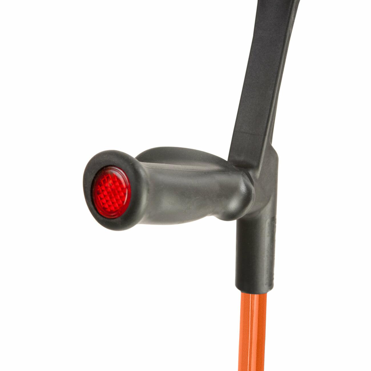 Comfort grip handle of an orange Flexyfoot Comfort Grip Open Cuff Crutch