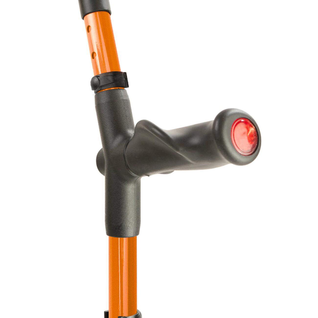 Comfort grip handle of an orange Flexyfoot Comfort Grip Double Adjustable Crutch