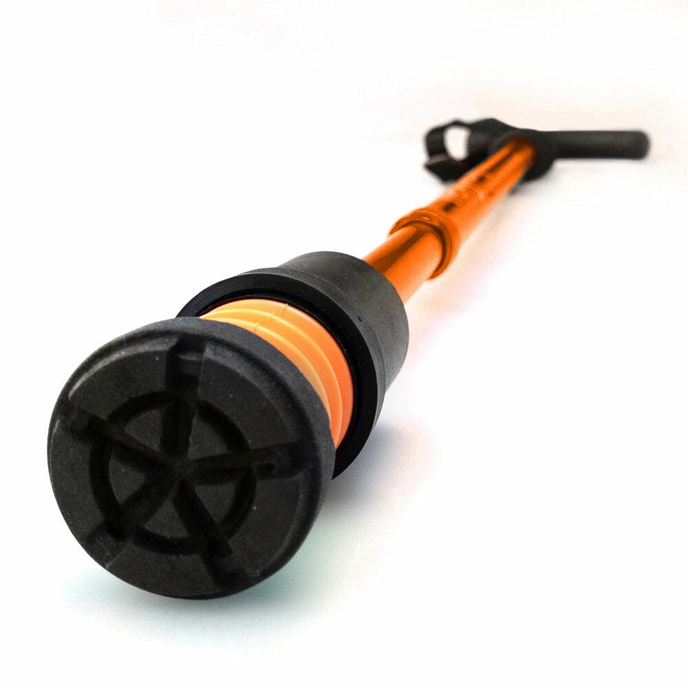 The ferrule of the orange Flexyfoot Premium Derby Handle Walking Stick