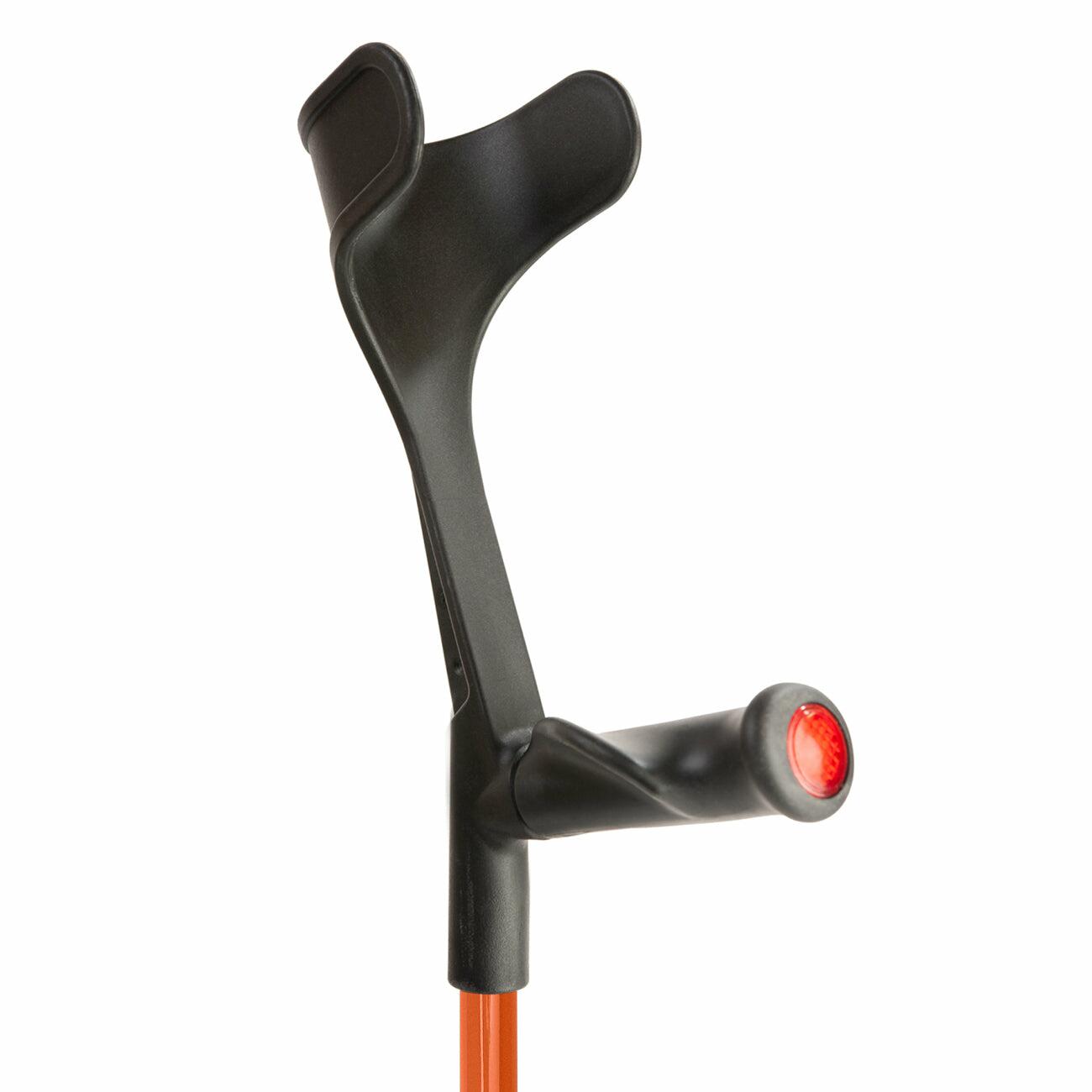 Comfort grip handle and open cuff of an orange Flexyfoot Comfort Grip Open Cuff Crutch