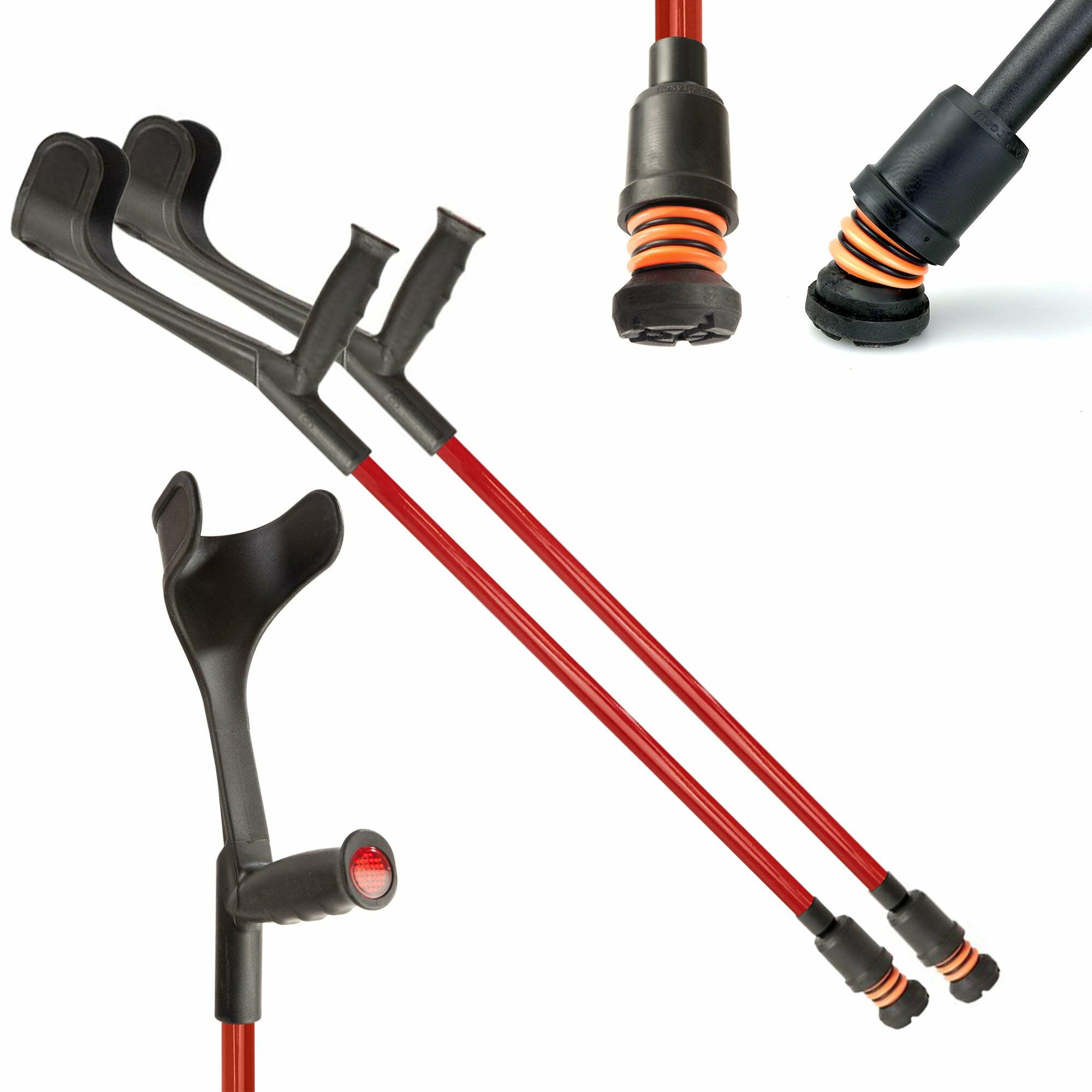 A pair of red Flexyfoot Soft Grip Open Cuff Crutches