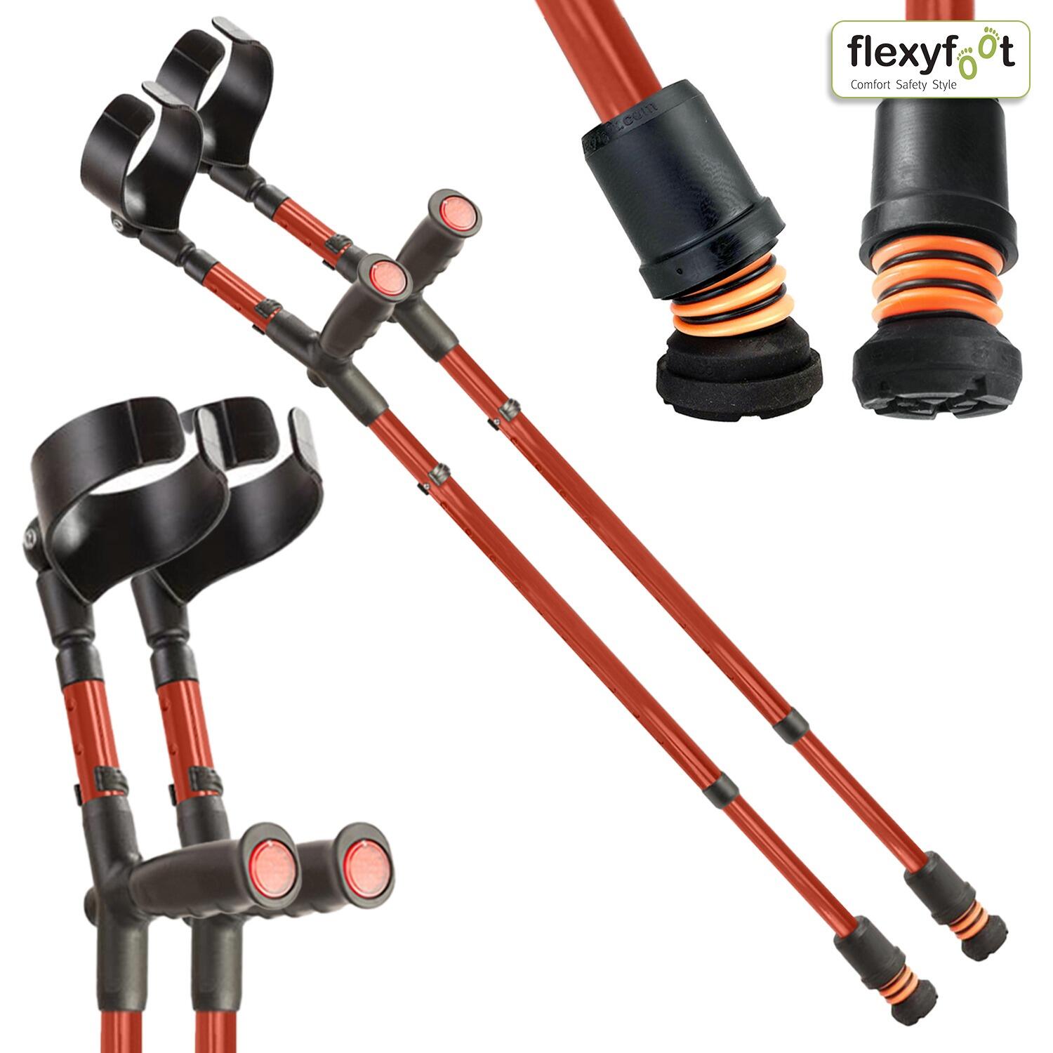 A pair of red Flexyfoot Soft Grip Double Adjustable Crutches