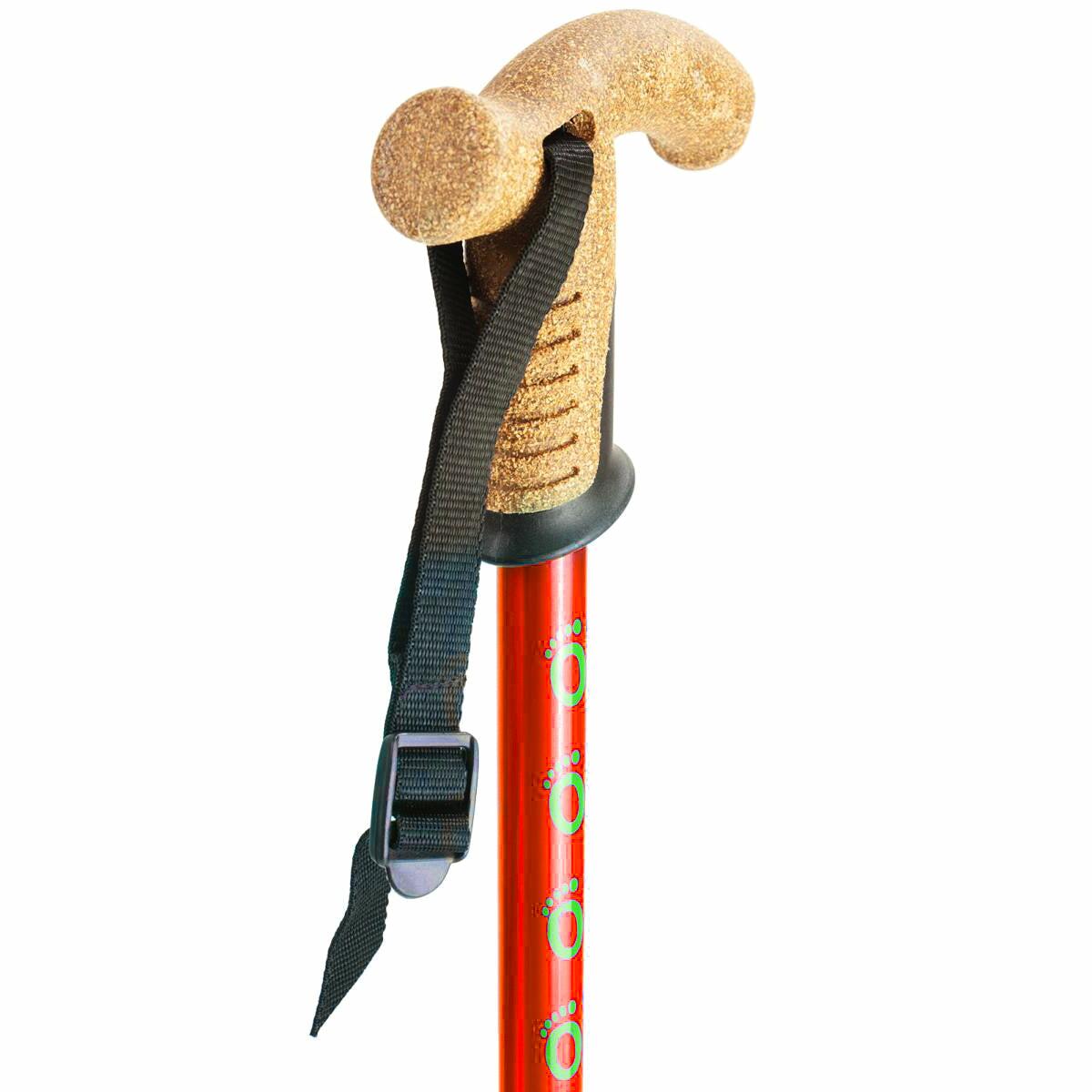 The cork handle of a red Flexyfoot Premium Cork Handle Walking Stick