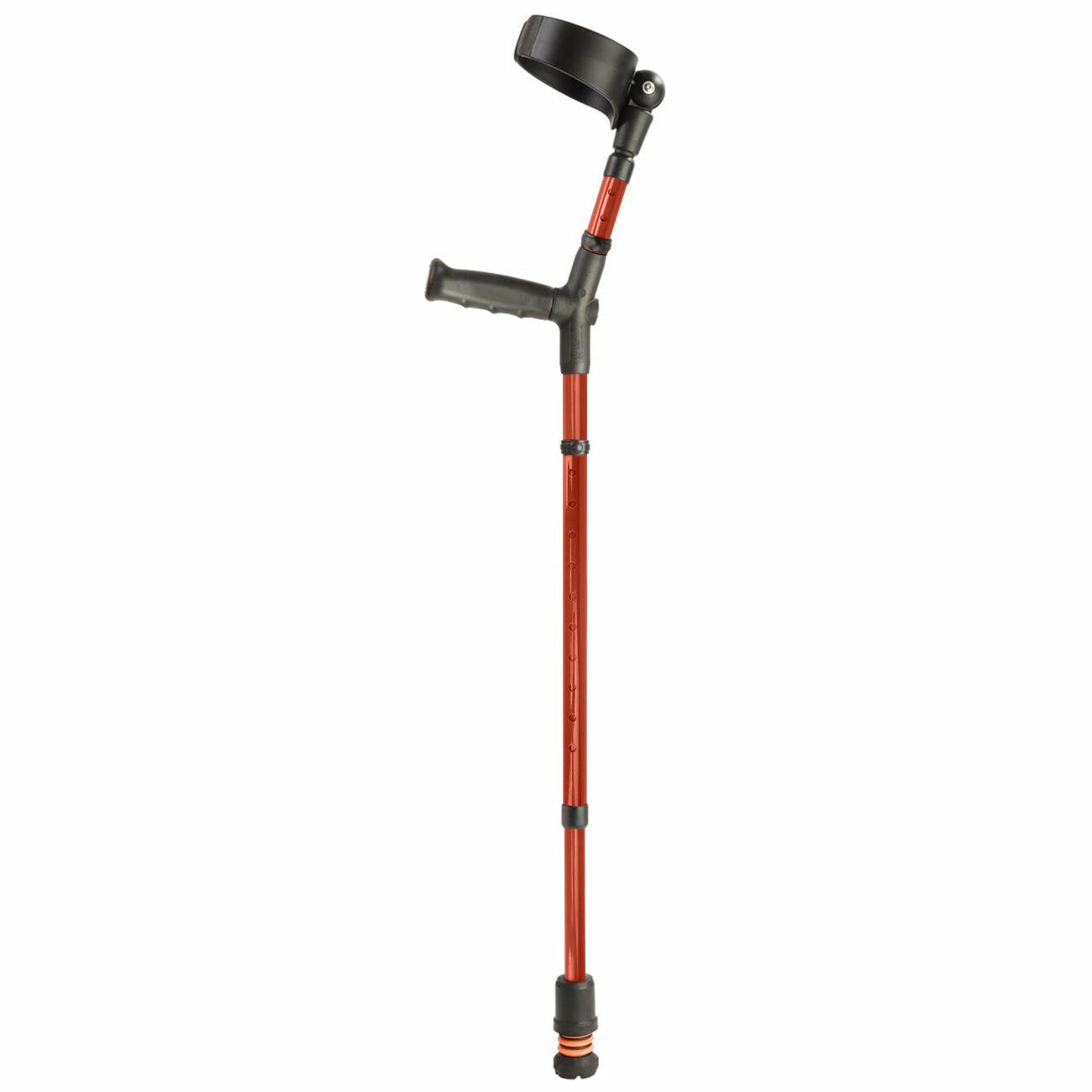A single red Flexyfoot Soft Grip Double Adjustable Crutch