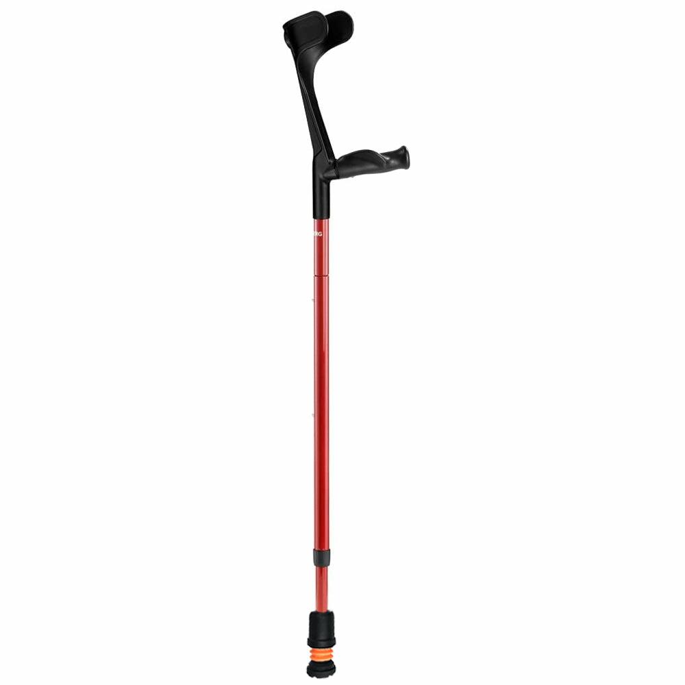 A red Flexyfoot Carbon Fibre Comfort Grip Folding Crutch