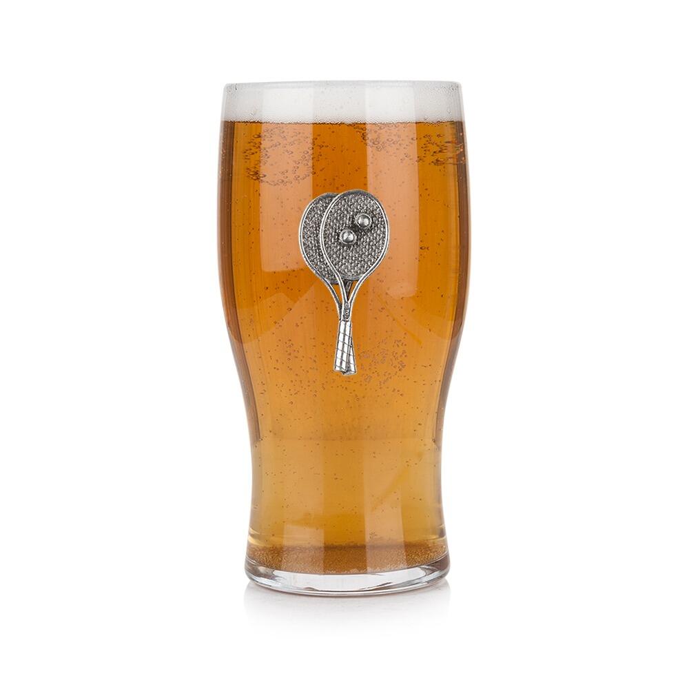 Pint glass with handmade pewter tennis badge, filled with golden beer