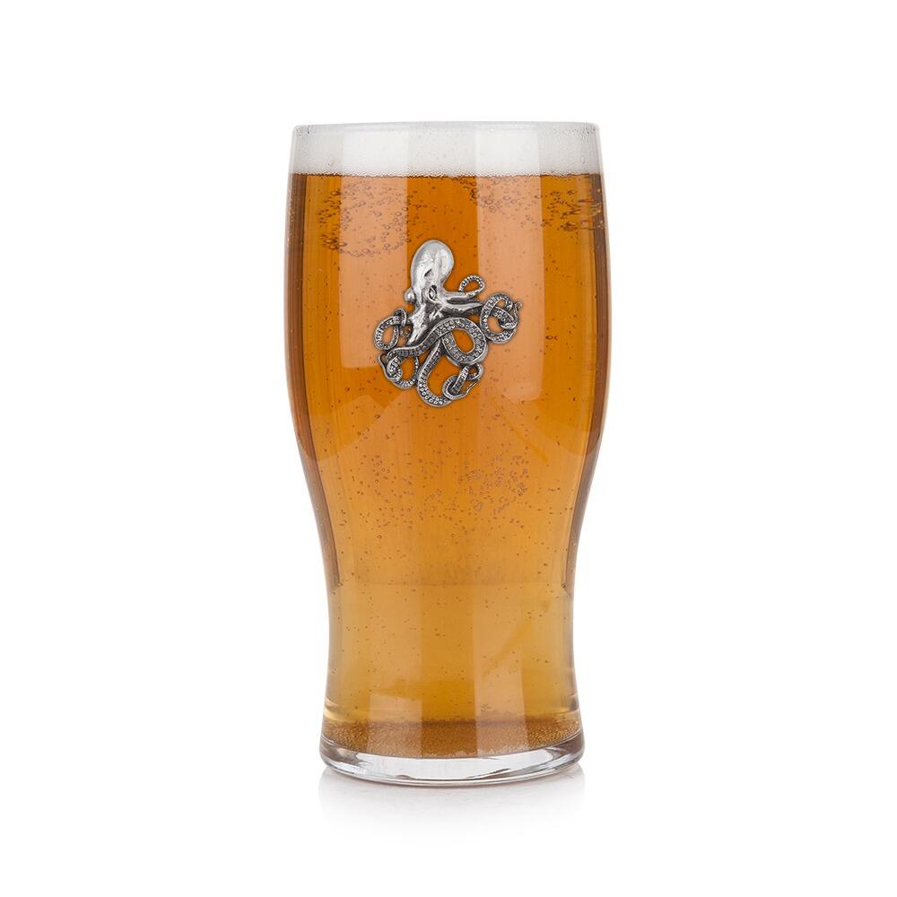 Pint glass with handmade pewter octopus badge, filled with golden beer