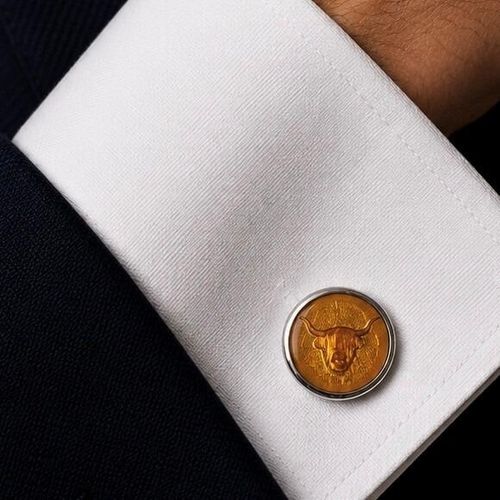 Handcrafted pewter cufflinks with a detailed Highland cow embossed in transparent yellow enamel