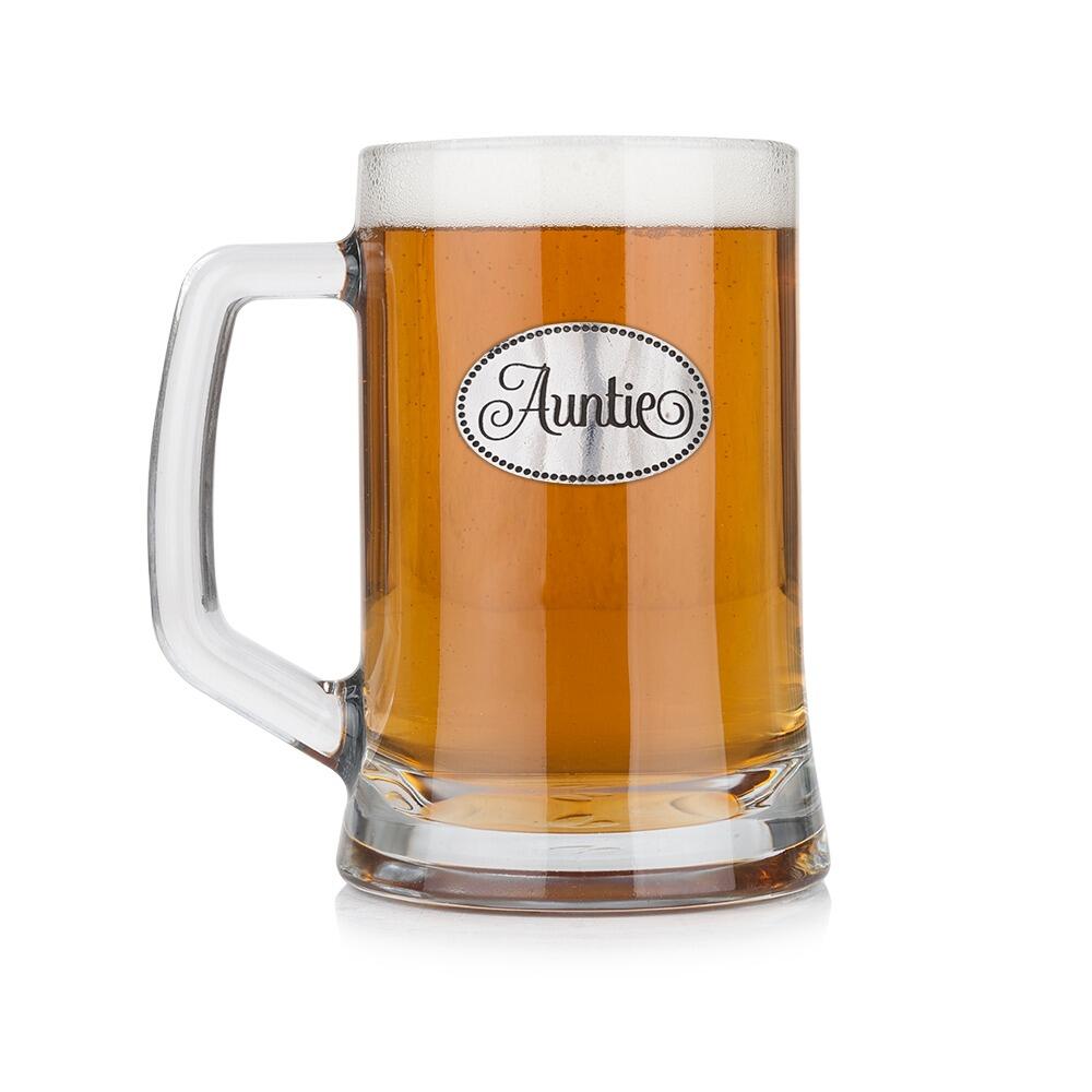 A Beer Tankard with a Pewter Auntie badge on the front, filled with Amber BeerRetryClaude can make mistakes. Please double-check responses.