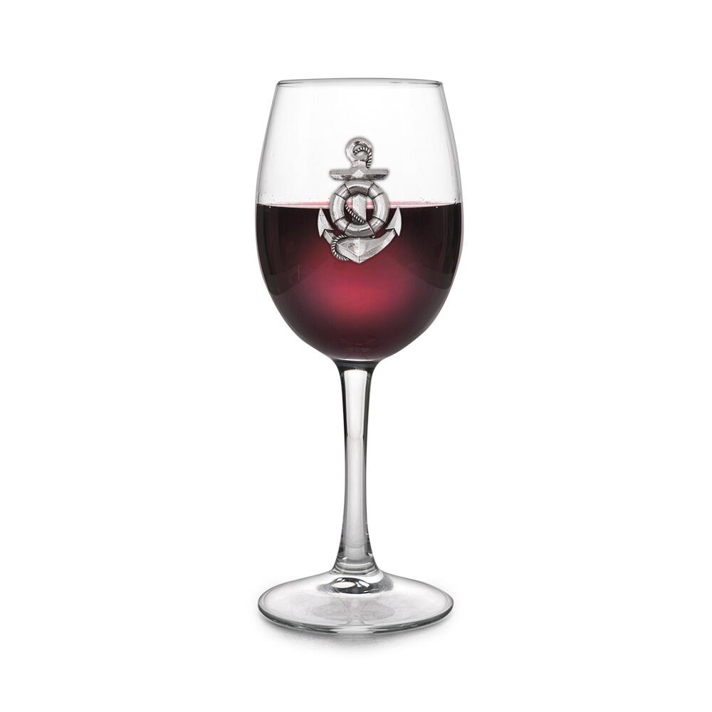 Wine glass with handcrafted pewter Anchor badge filled with red wine