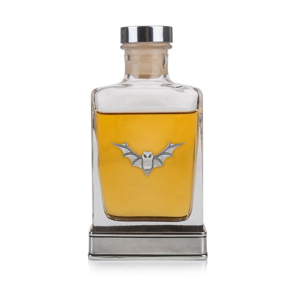 Handcrafted glass hip flask with pewter base featuring detailed bat emblem on front