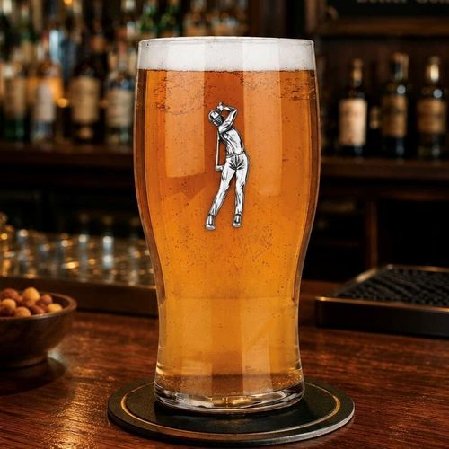 Pint glass with handmade pewter golfing badge featuring golfer swing pose filled with golden beer