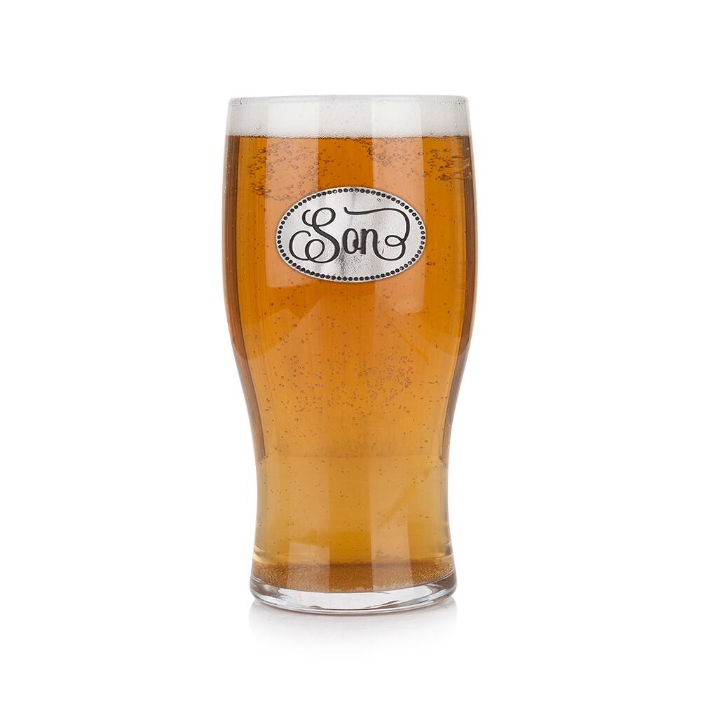 Pint glass with handmade pewter “Son” badge, filled with golden beer