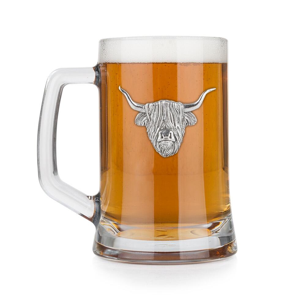 A Beer Tankard with a Pewter Highland Cow badge on the front, filled with Amber BeerRetryClaude can make mistakes. Please double-check responses.