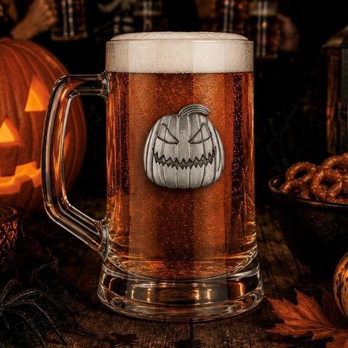 Glass beer tankard featuring an embossed pewter pumpkin motif badge