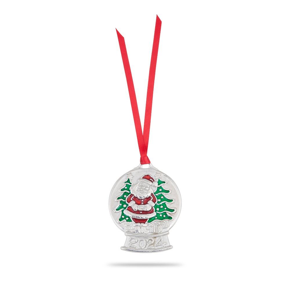 2024 snow globe ornament featuring Santa Claus with Christmas trees in silvery pewter finish with red and green enamel details, hanging from a red ribbon