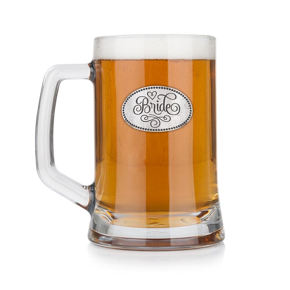 A Beer Tankard with a Pewter Bridesmaid badge on the front, filled with Amber BeerRetryClaude can make mistakes. Please double-check responses.