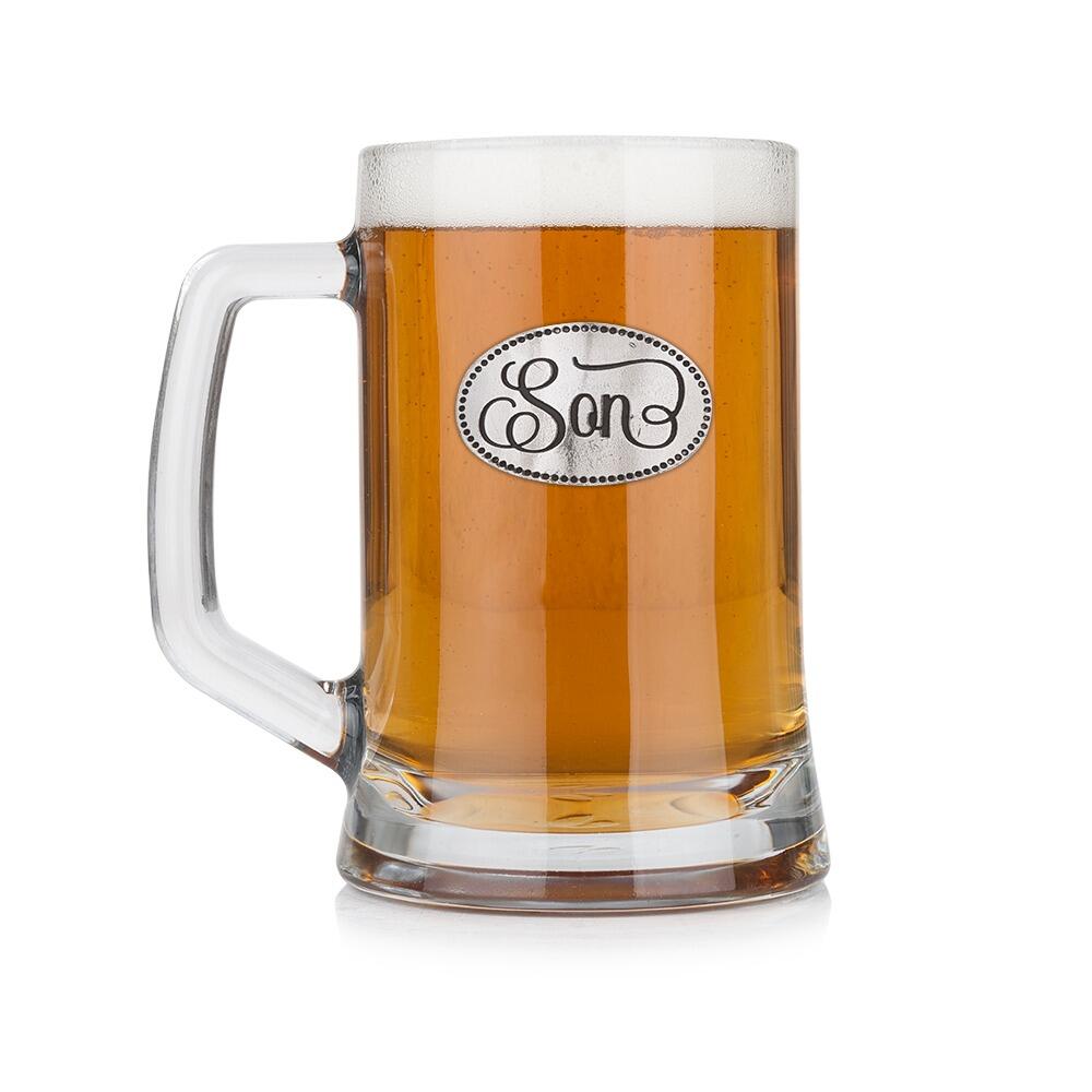 A Beer Tankard with a Pewter Son badge on the front, filled with Amber BeerRetryClaude can make mistakes. Please double-check responses.