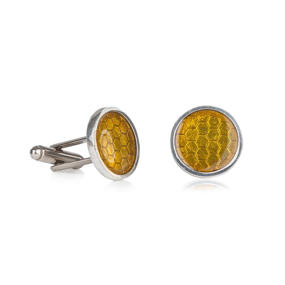 Handcrafted pewter cufflinks with a detailed honeycomb pattern embossed in transparent yellow enamel