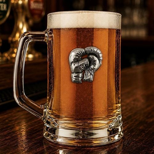 A Beer Tankard with a Pewter Boxing badge on the front, filled with Amber Beer