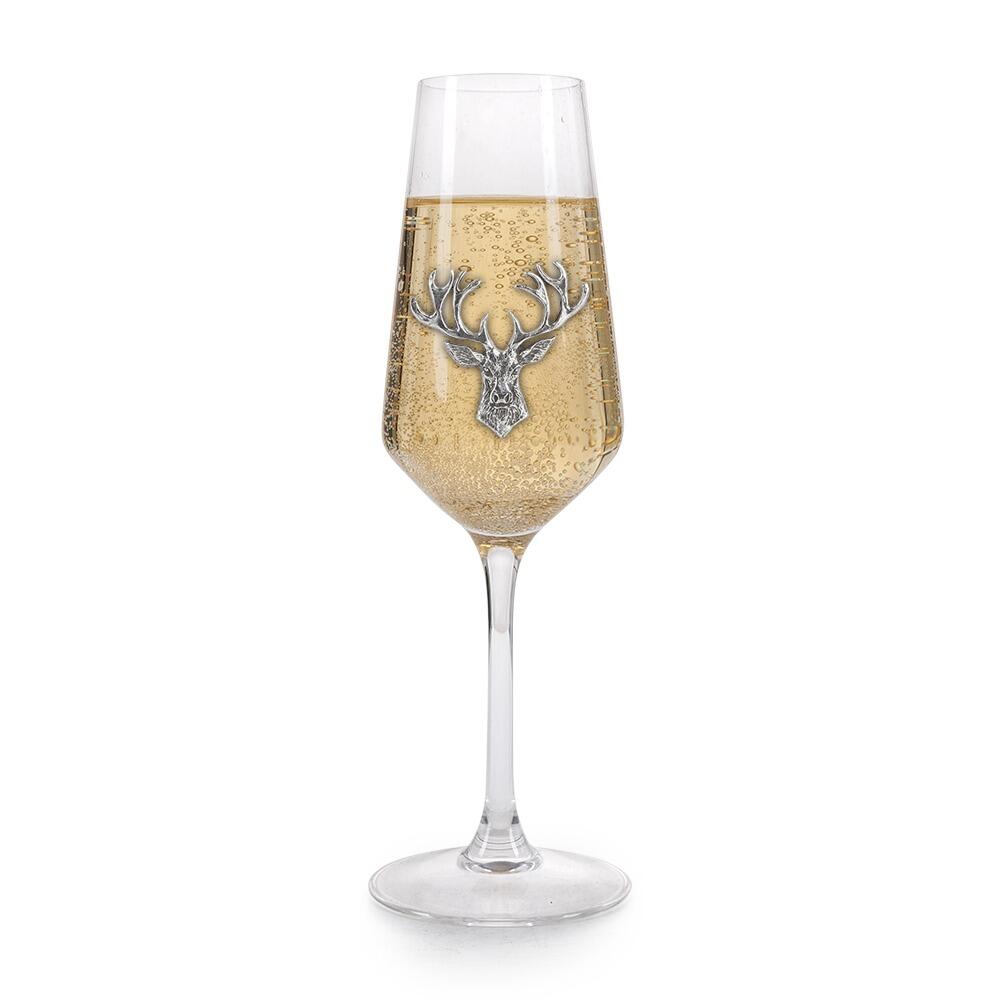 A Champagne Flute with a Pewter Stag badge on the front, filled with Champagne
