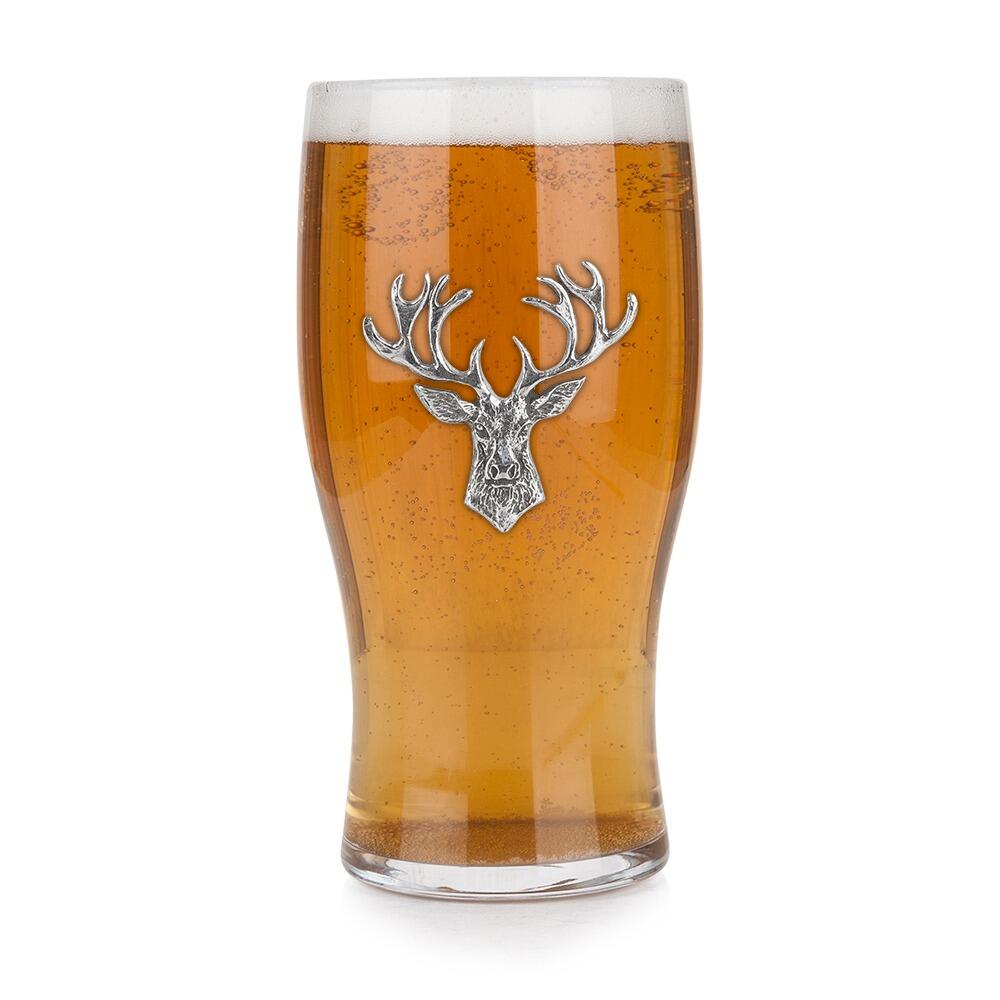 Pint glass with handmade pewter stage with detailed curtains and lighting badge filled with golden beer