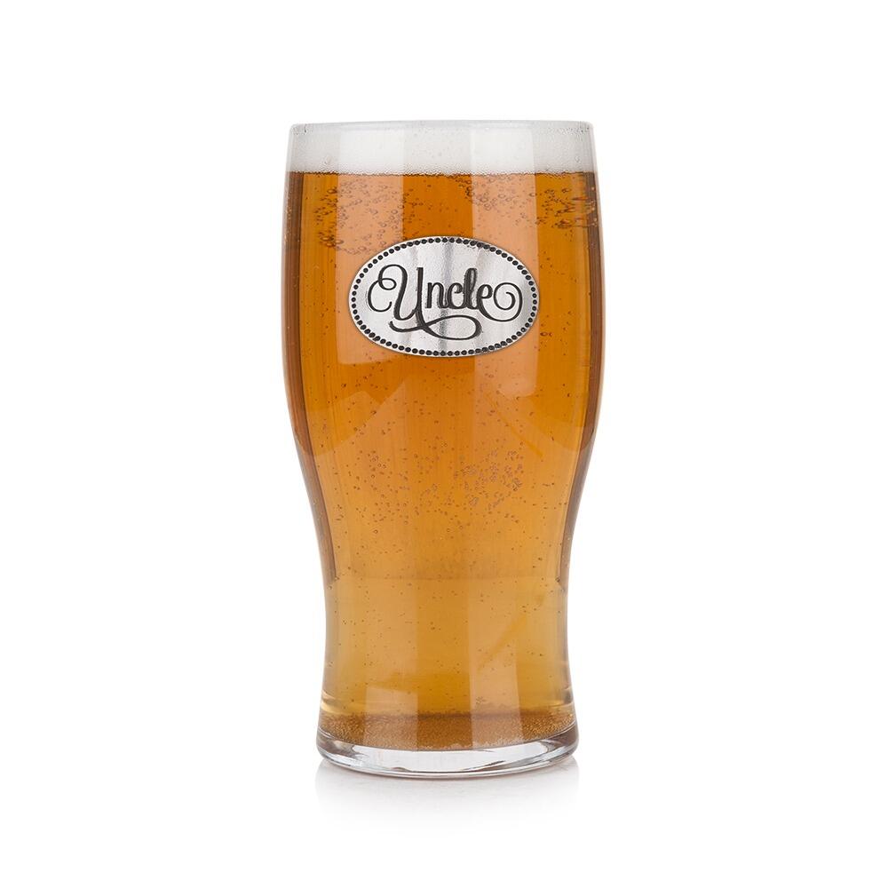 Pint glass with handmade pewter “Uncle” badge, filled with golden beer