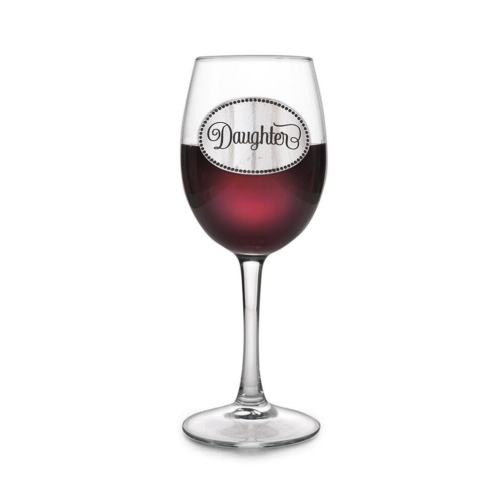 Wine glass with handcrafted pewter Daughter badge filled with red wine
