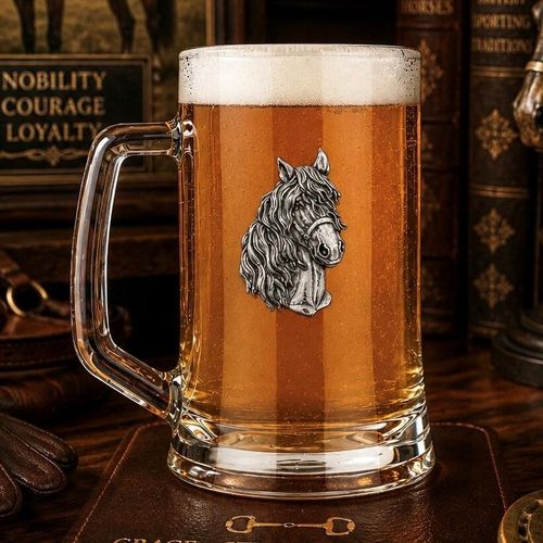 A Beer Tankard with a Pewter Horse badge on the front, filled with Amber Beer