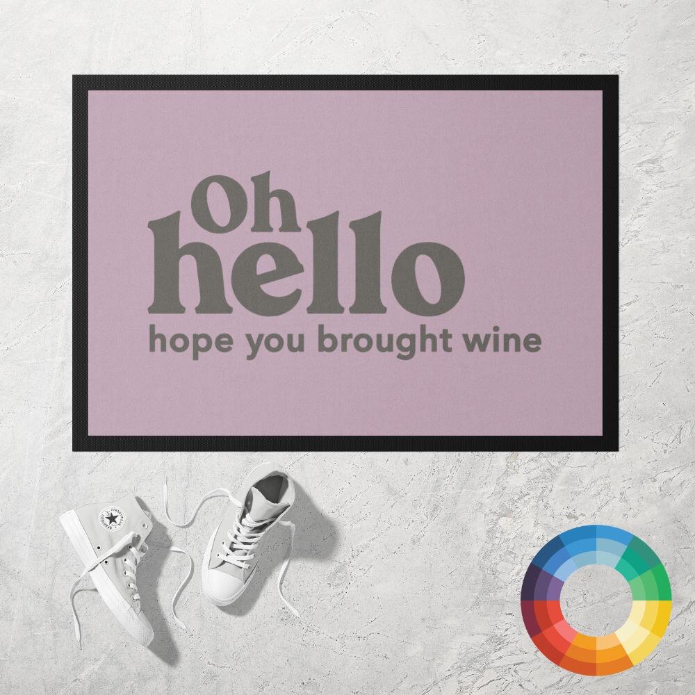 OH HELLO HOPE YOU BROUGHT WINE Doormat in dusky pink