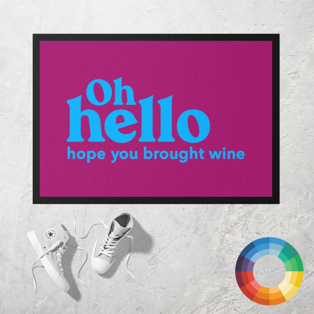 OH HELLO HOPE YOU BROUGHT WINE Doormat in maroon