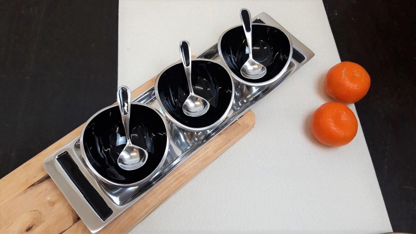 black condiment set with tray and spoons