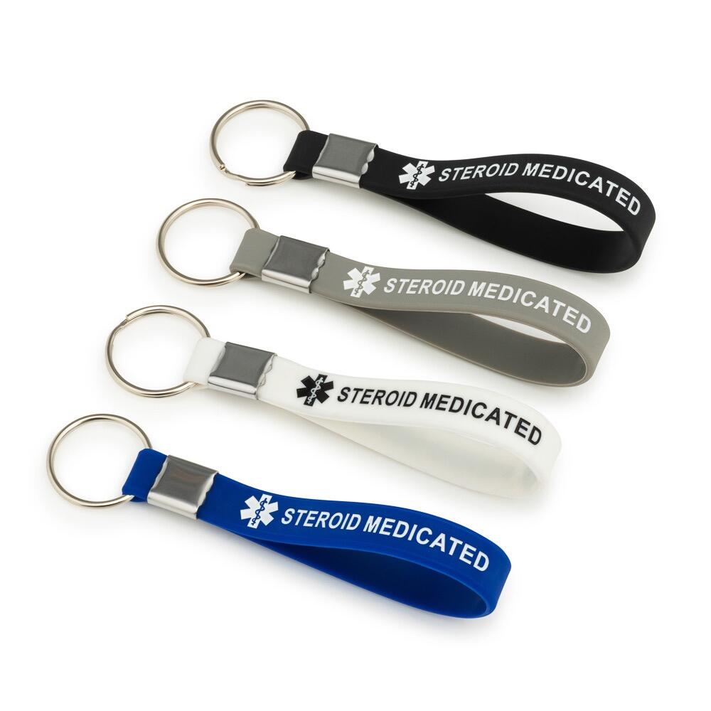 Steroid Medicated Keyrings, multiple colours laid next to each other