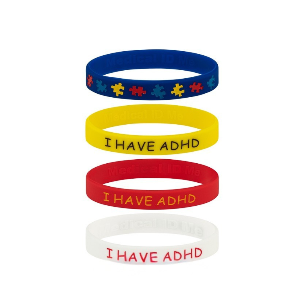 I Have ADHD silicone bracelet in multiple colours stacked together
