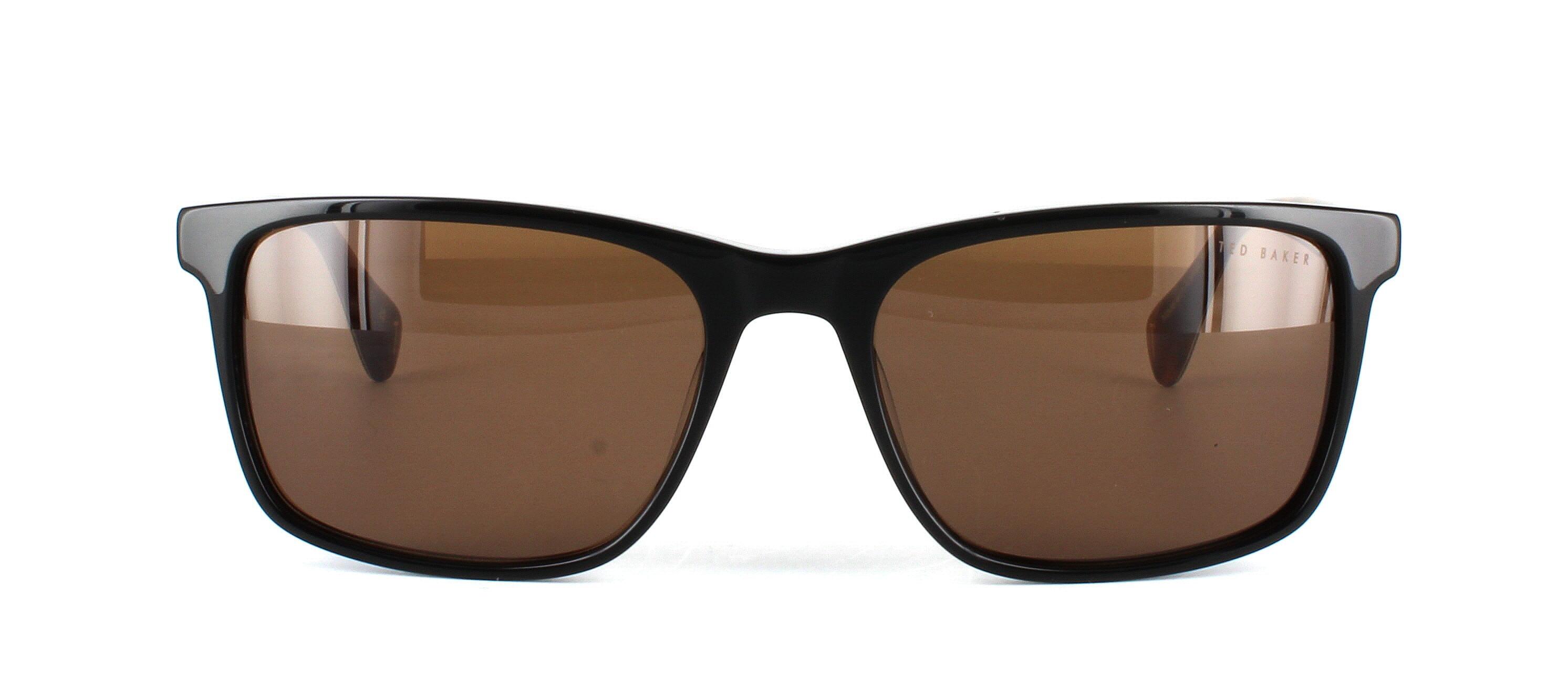 Ted Bake isaac in black with tortoise arms. Unisex acetate frame with rectangular shaped lenses and barrel hinges leading to matt tortoise arms with a shiny reverse - image view 5