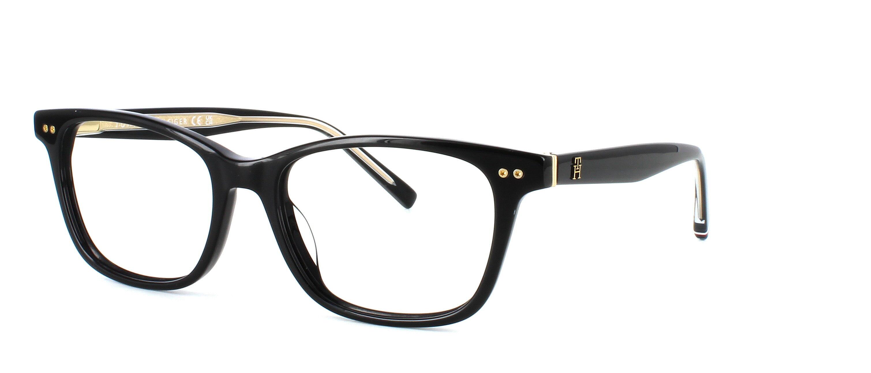 Ladies iconic style acetate with oval, very slightly cat eye shaped lenses with robust barrel hinges and embossed TH logo on the temples - image view 1
