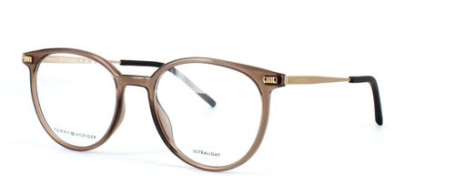 Round shaped polyamide and stainless steel women's glasses in crystal brown with gold arms and rubber ear tips - image view 1