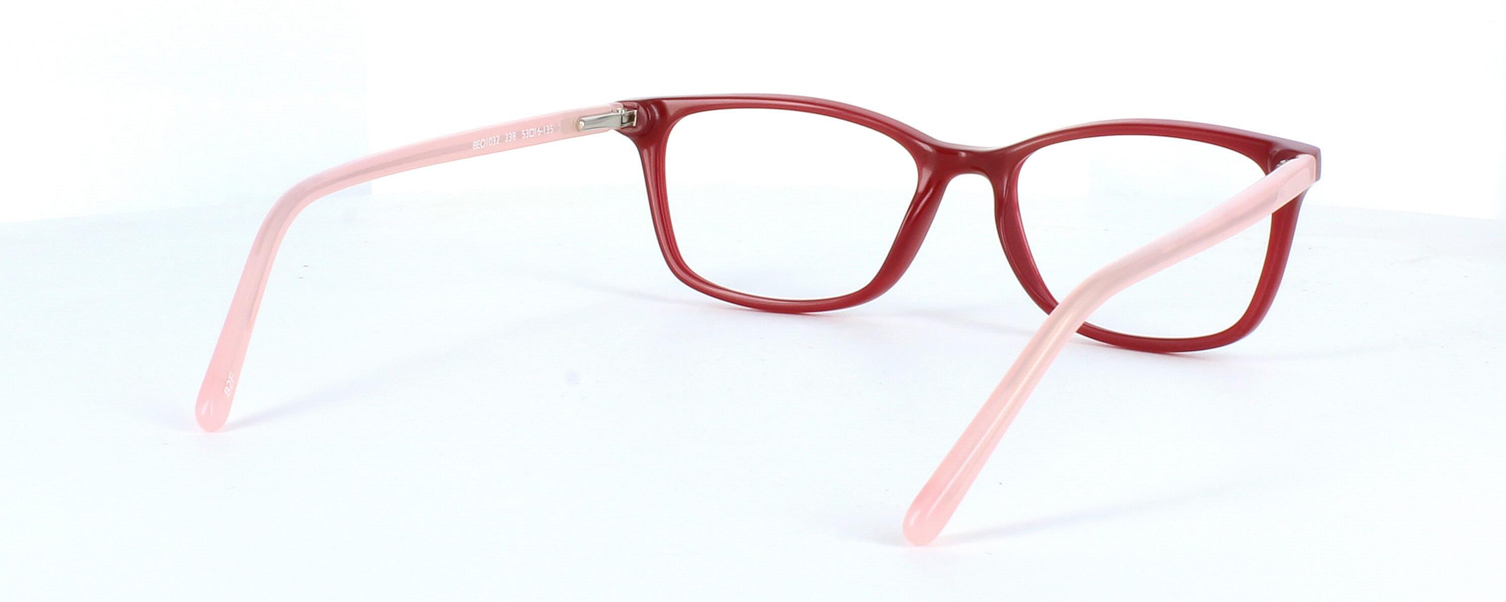 Benetton BEO1032 238 - Women's oval shaped plastic glasses with red front face and pale pink sprung hinged arms - image view 4