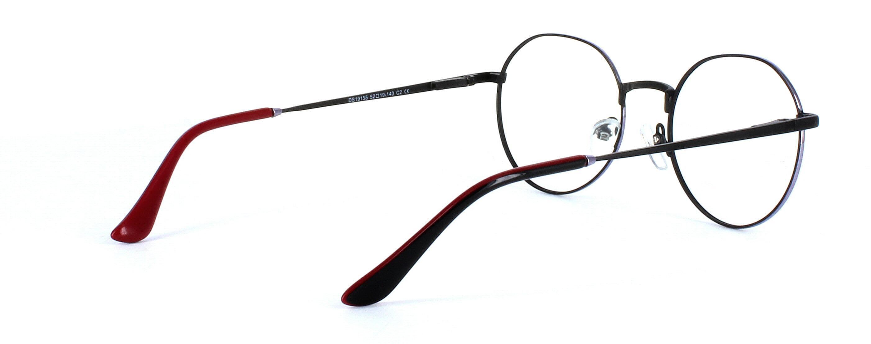 Round shaped unisex metal glasses in black with red arm tips - image view 4