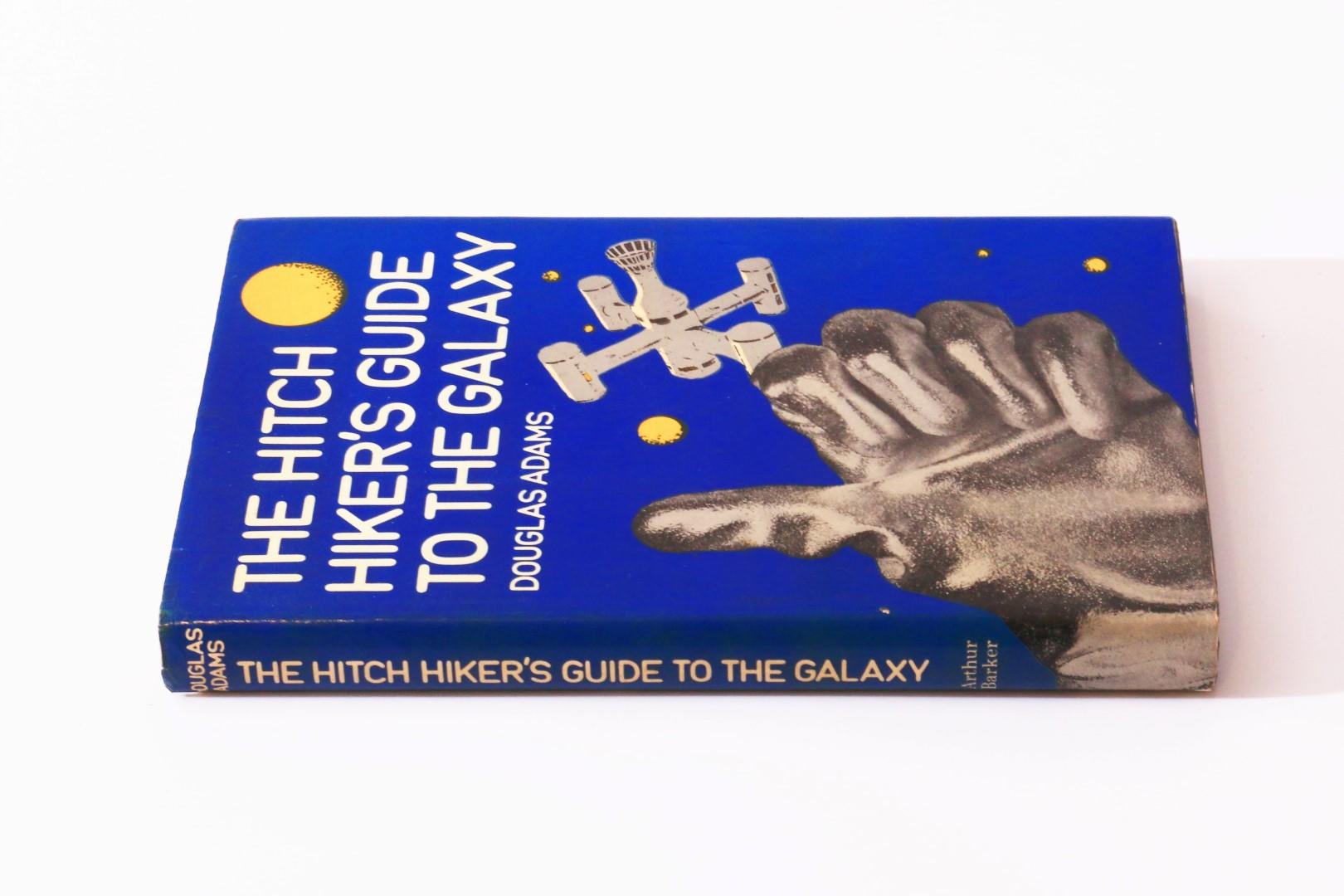 Douglas Adams - The Hitch Hiker's Guide to the Galaxy - Arthur Barker, 1979, First Edition.
