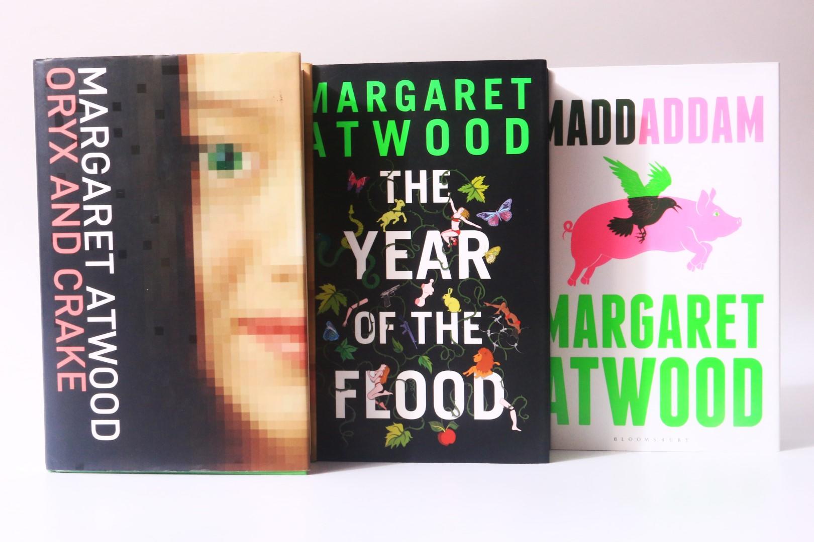 Margaret Atwood - The MaddAddam Trilogy [comprising] Oryx and Crake, The Year of the Flood and MaddAddam - Bloomsbury, 2003-2013, Signed First Edition.
