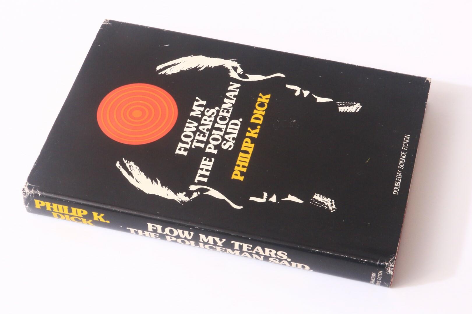 Philip K. Dick - Flow My Tears, The Policeman Said - Doubleday, 1974, First Edition.