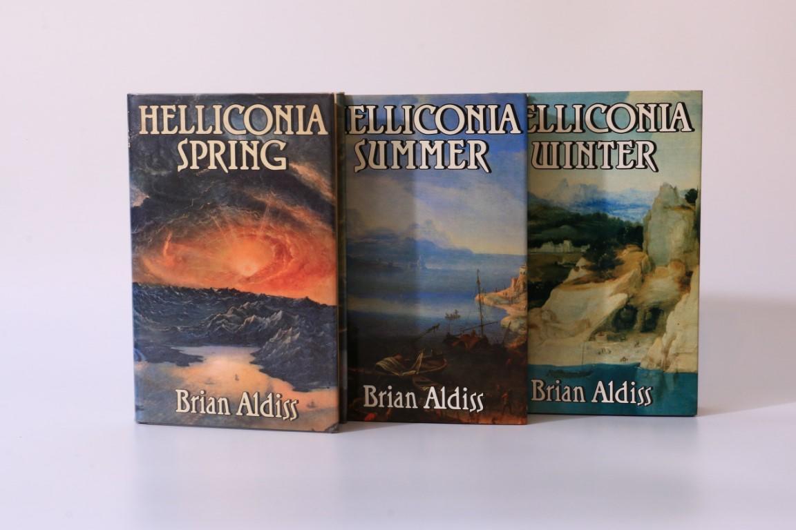Brian Aldiss - The Helliconia Trilogy [comprising] Spring, Summer and Winter - Jonathan Cape, 1982-1985, First Edition.